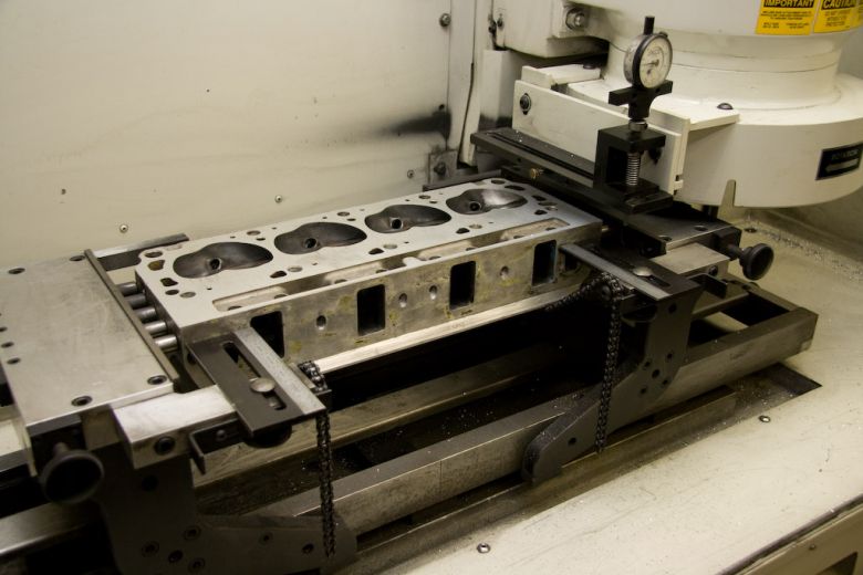 This machine decks heads
